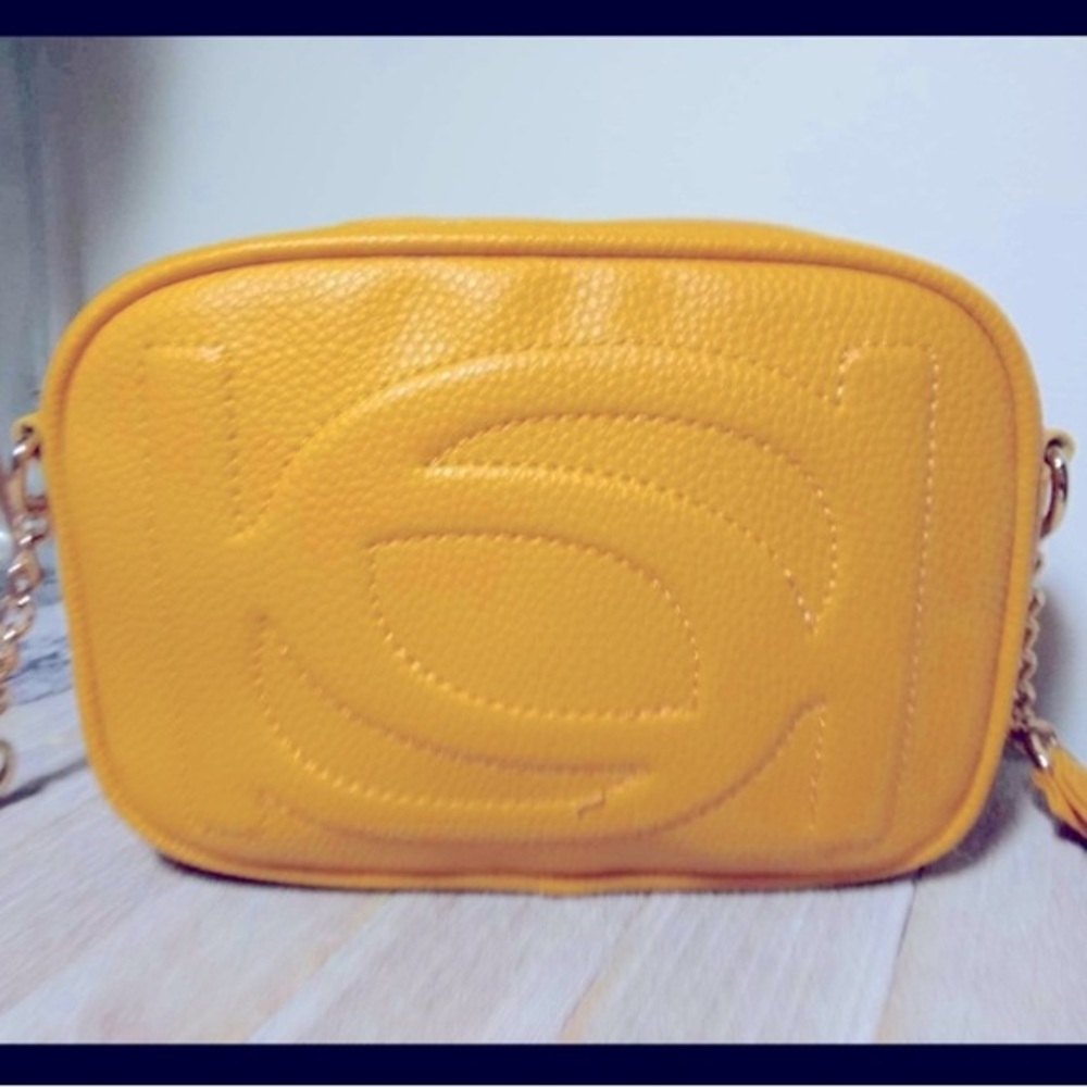 Bebe los Angeles purse. Mustard. Gold hardware. Never used NWOT Adjustable strap